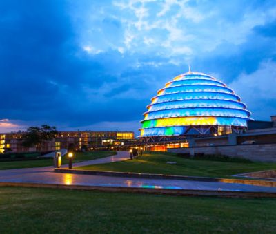 Dramatic photo of Kigali Convention Centre at night on cloudy evening. City tours on African safaris